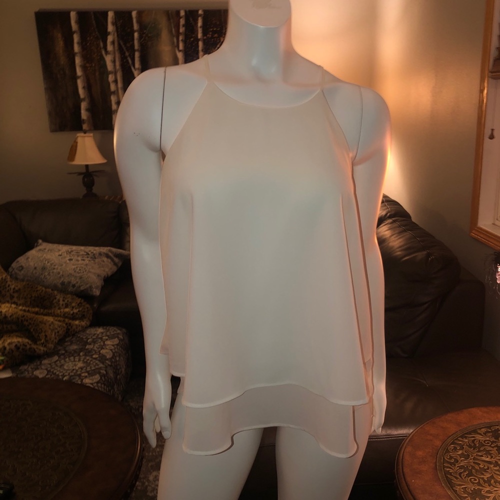 Beautiful gently used White Ruffle Tank Top